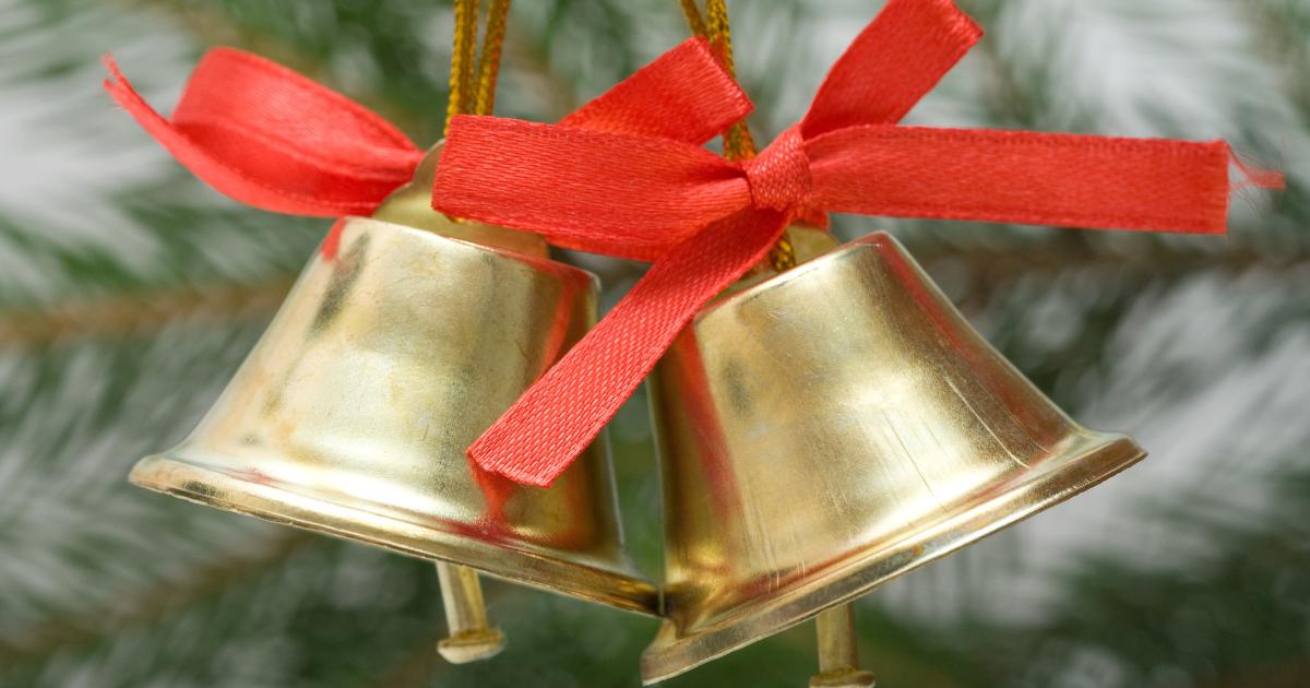 Christmas bells adorned with a red ribbon, capturing a festive and joyful holiday spirit.